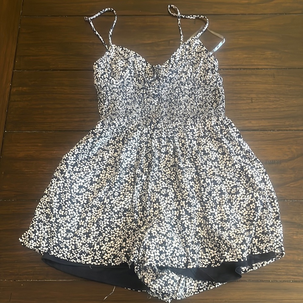 navy blue tillys floral romper size xs.